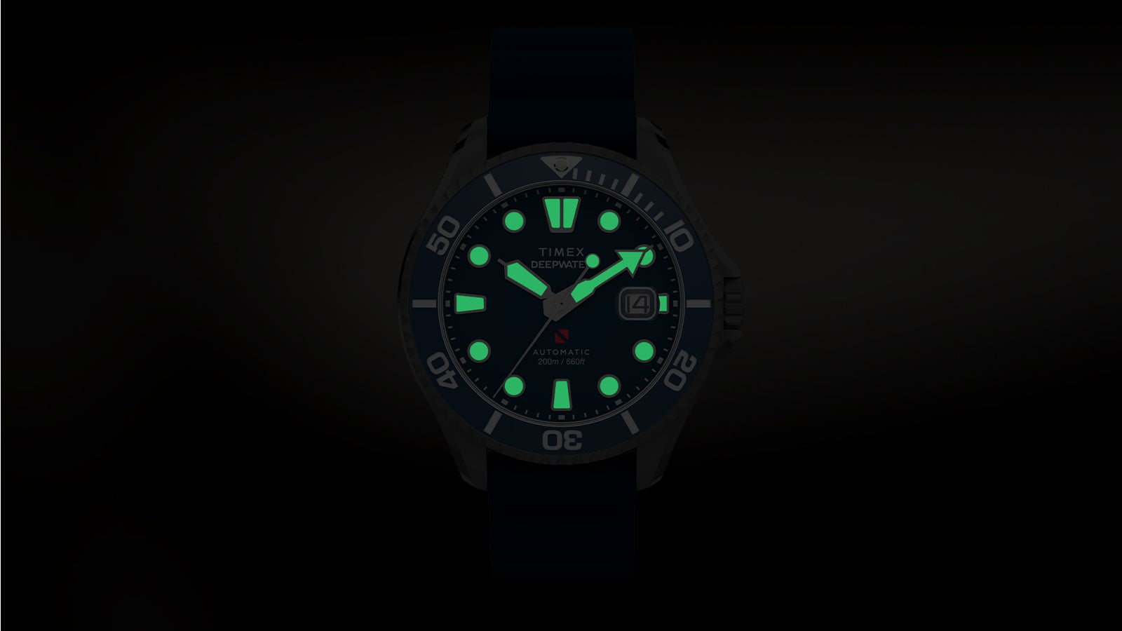 Front view of the Timex Deepwater Meridian 200 with luminescent hour markers and hands glowing brightly in the dark.
