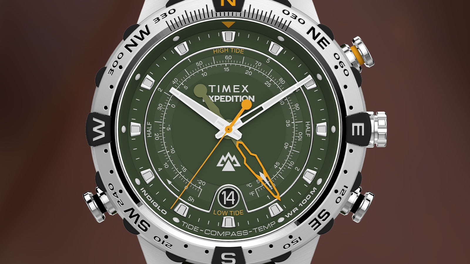 Close-up of the Timex Expedition® Tide-Temp-Compass watch face, featuring a green dial, white hour markers, compass bezel, tide tracking, and temperature function.