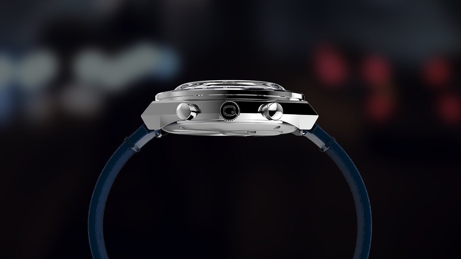 Side profile of the Q Timex® Chronograph with polished case, chronograph pushers, crown with Q logo, and blue strap.