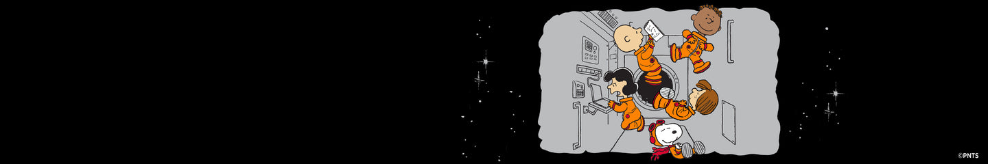 A wide banner illustration featuring Snoopy, Charlie Brown, Lucy, Franklin, and Peppermint Patty floating in zero gravity inside a gray spacecraft cabin, dressed in orange space suits, against a black starry background.