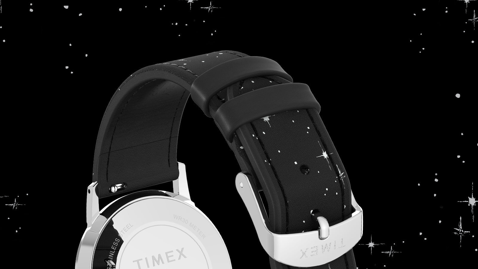Rear view of the Timex x Peanuts® Marlin® Hand-Wound watch showcasing the stainless steel caseback and black leather strap with starry space pattern. The polished buckle is engraved with the Timex logo.