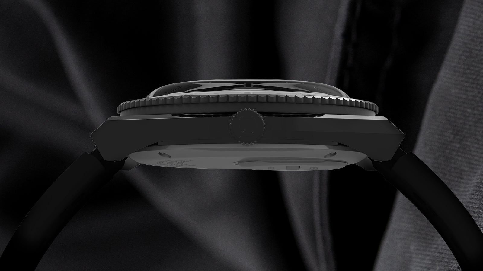 Side profile of the Q Timex GMT watch showing its slim matte black case, ridged rotating bezel, and slightly domed crystal. The crown and smooth case edges are visible, emphasizing the sleek, low-profile design.