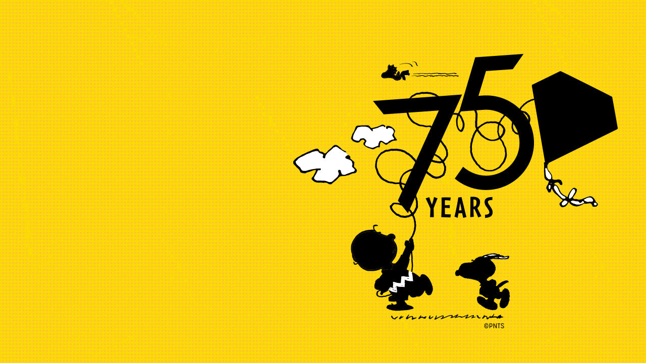 Playful yellow Peanuts 75th Anniversary artwork featuring Charlie Brown flying a kite tangled in the number “75” while Snoopy and Woodstock look on, celebrating 75 years of Peanuts charm.