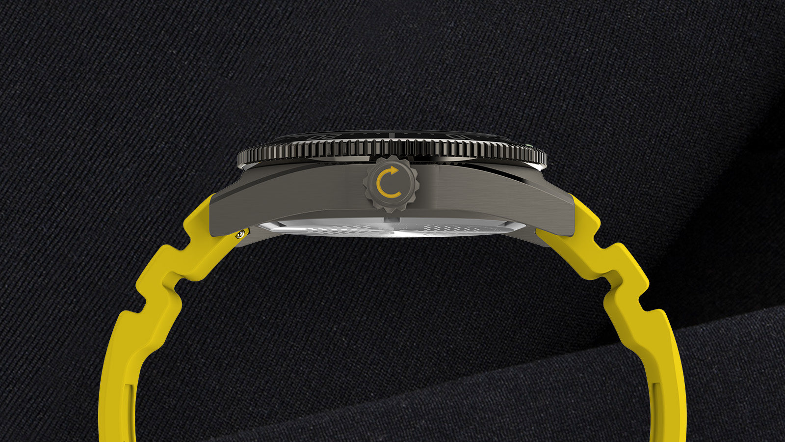 Side profile of Timex Deepwater Reef 200 dive watch showing brushed titanium-tone case, black bezel, and yellow silicone strap against dark textured fabric.