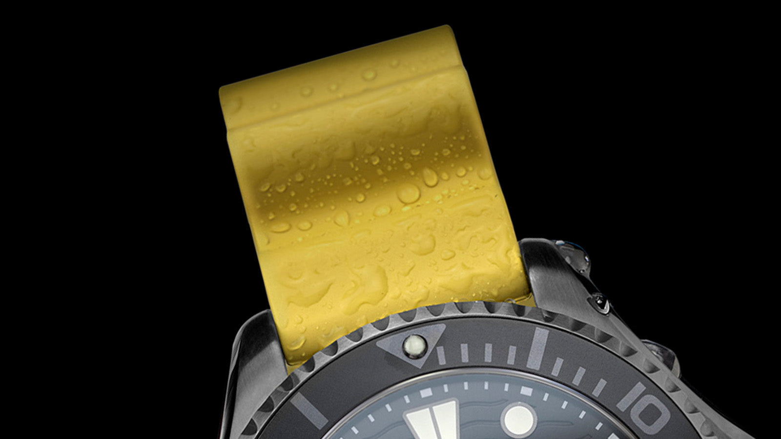 Close-up of the Timex Deepwater Meridian 200’s yellow silicone strap with visible water droplets, capturing durability and sport-inspired design.