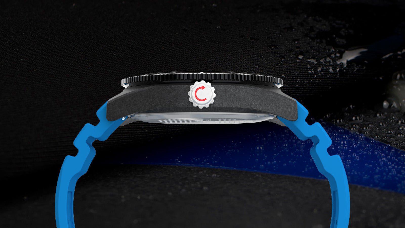 Side profile of the Timex Deepwater Reef 200 XCF showing its stainless-steel case and black rotating bezel, paired with a contoured blue strap for a secure dive fit.