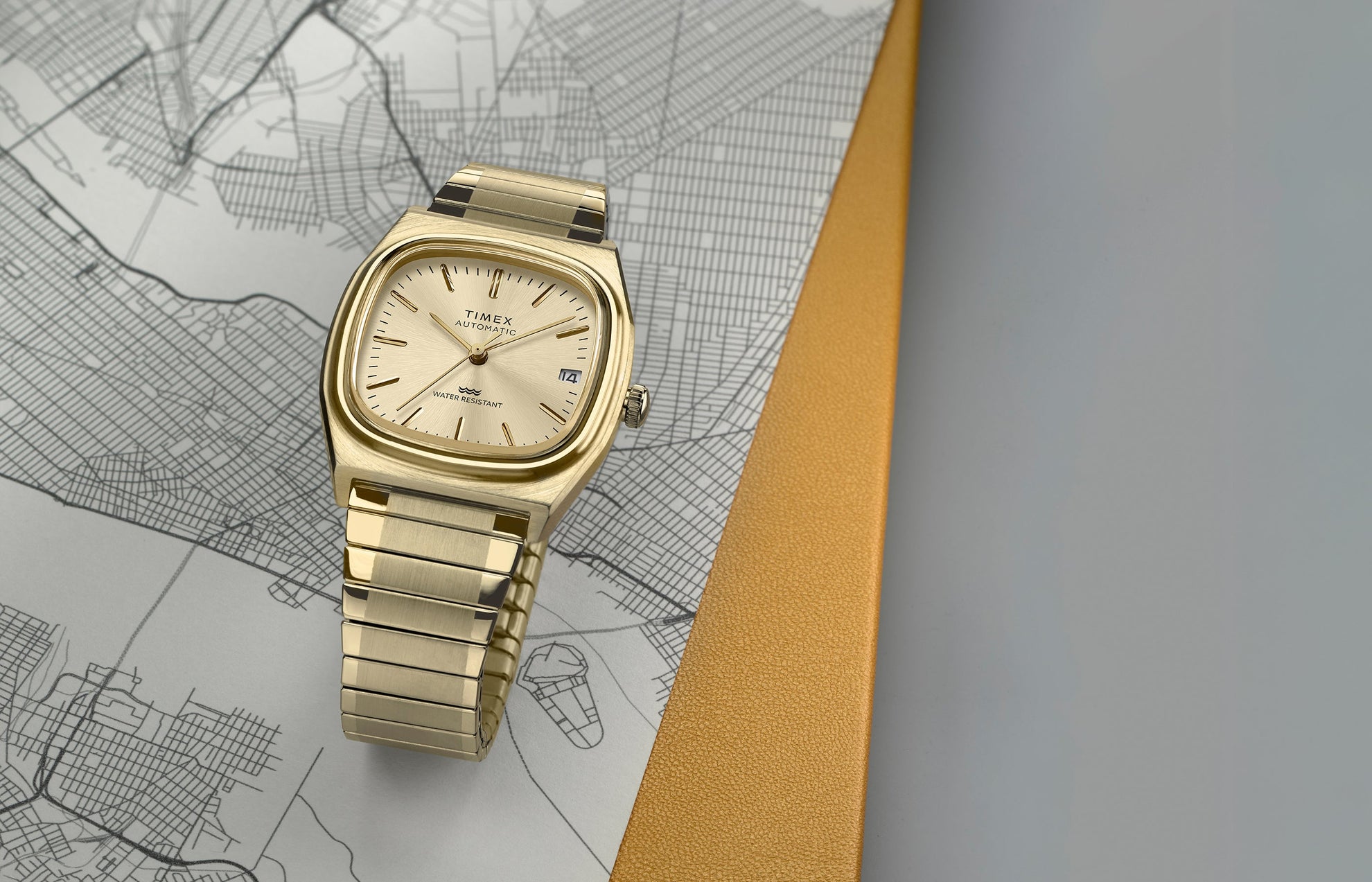 timex automatic 1983 e line reissue dress watch Timex Automatic 1983 E Line Reissue 34mm Gold-Tone Expansion Band Watch