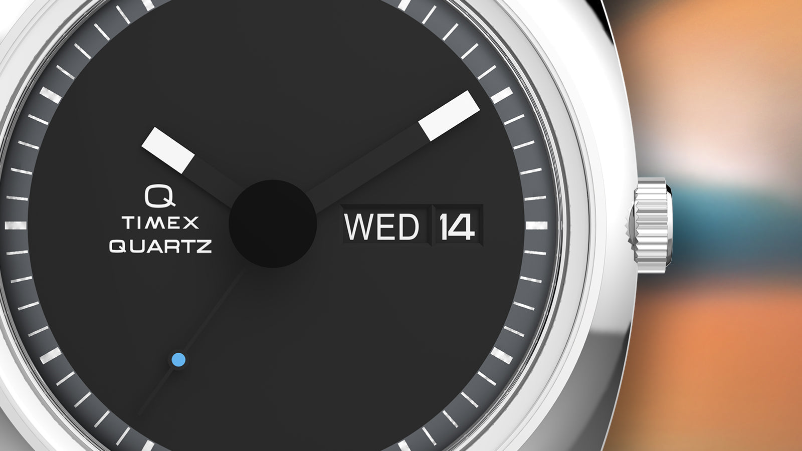 Close-up of the Q Timex® 1975 Enigma dial highlighting the date and day window, geometric hands, and clean indices with a black polished finish.