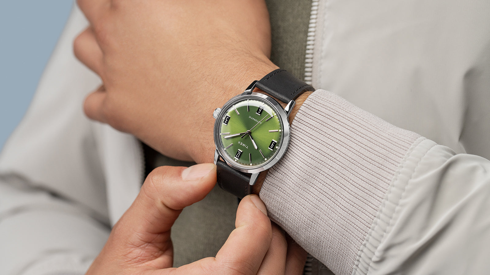 Close-up of Timex Marlin Automatic on wrist, showing the green dial with silver hands and markers.