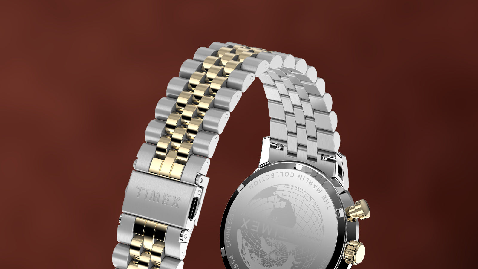 Rear view of Timex Marlin Chronograph Tachymeter showing two-tone stainless-steel bracelet and engraved caseback with globe motif.