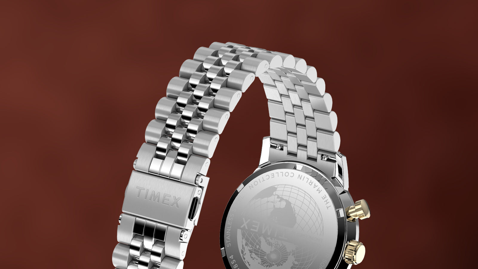 Back view of Timex Marlin Chronograph Tachymeter showing stainless-steel bracelet clasp engraved with Timex logo and caseback with globe design.