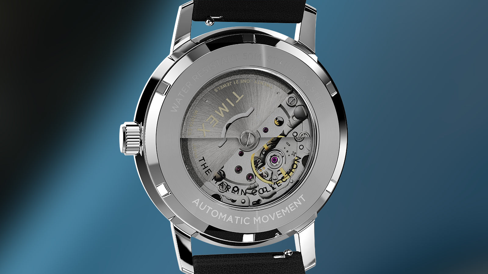Close-up of Timex Marlin Automatic caseback showing open-heart exhibition design with visible mechanical movement.