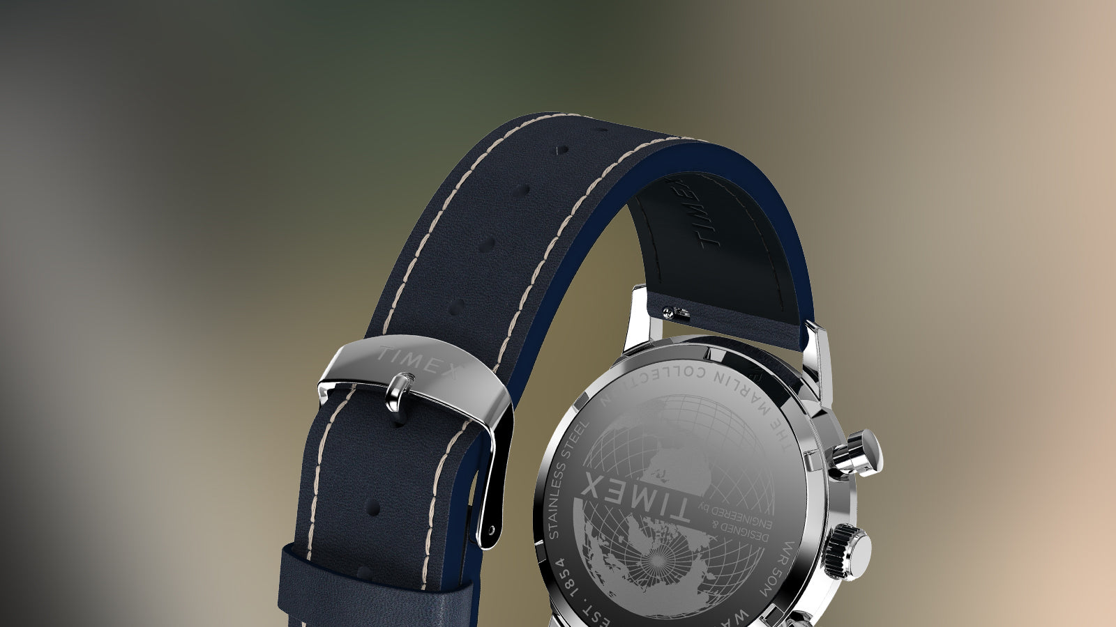 Rear view of Timex Marlin Chronograph Tachymeter showing engraved caseback and navy perforated leather strap.