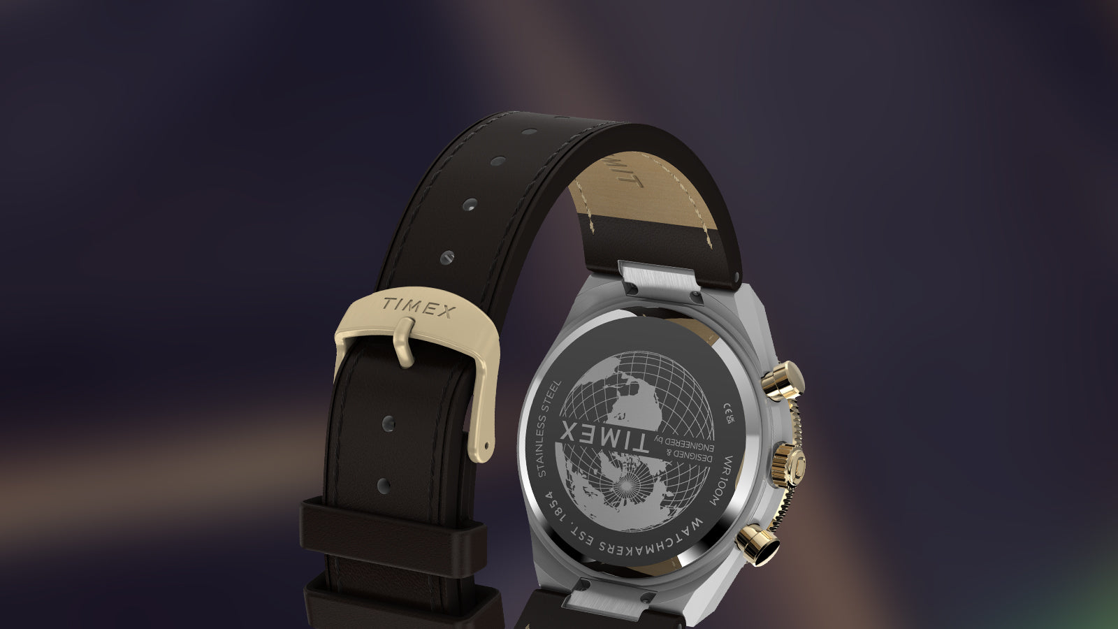 Rear view of the Q Timex® Continental Chronograph showing engraved stainless steel caseback and brown leather strap with Timex buckle.