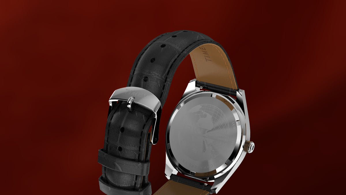 Rear view of the Q Timex® Red Vega 1978 Reissue watch showing the stainless steel caseback and black leather strap.