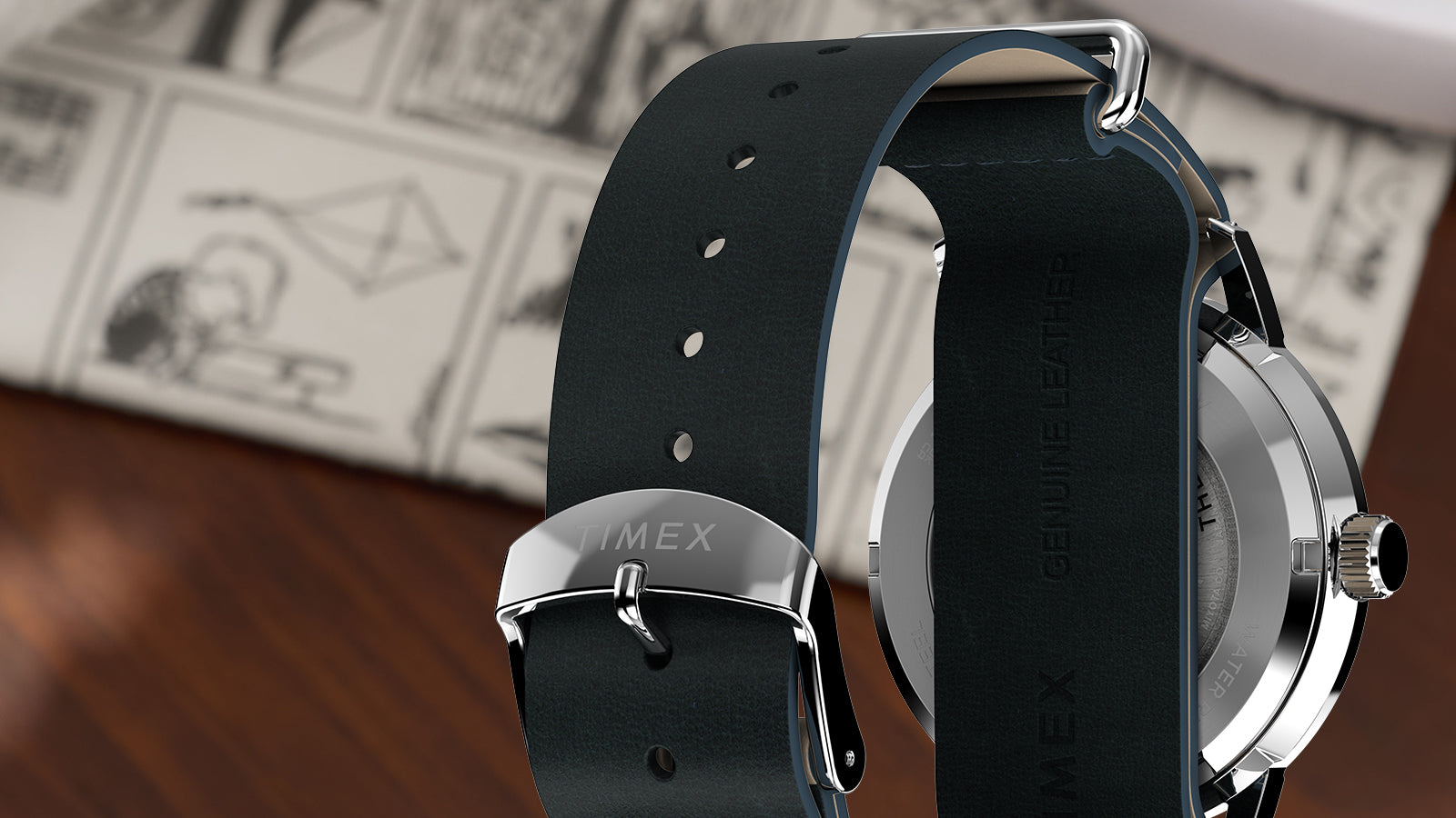 Detail of Peanuts® x Timex Marlin® Automatic Pickleball watch featuring dark green leather strap, stainless-steel buckle, and engraved caseback.