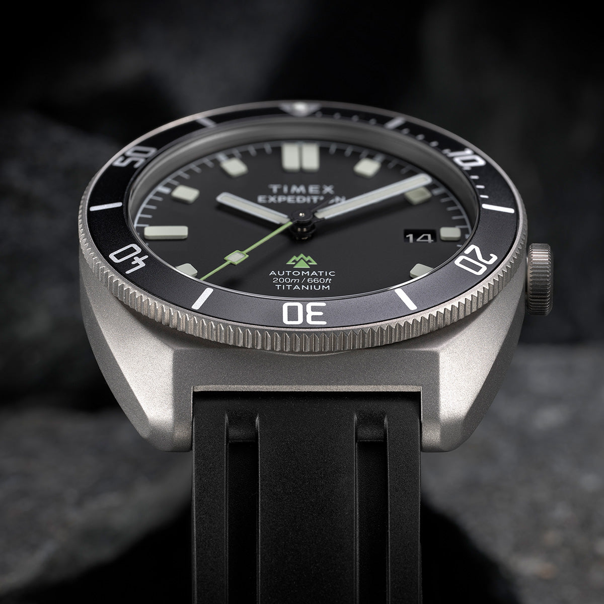 Close-up of Timex Expedition Pioneer Titanium Automatic dial showing date window and rotating bezel