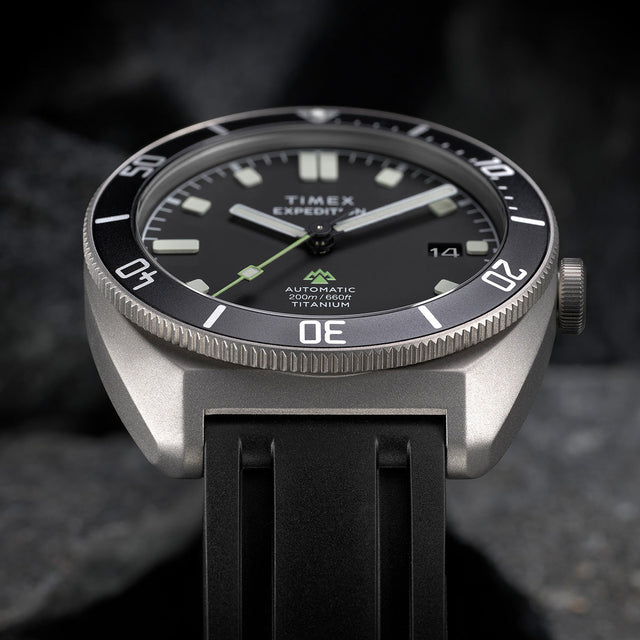 Close-up of Timex Expedition Pioneer Titanium Automatic dial showing date window and rotating bezel
