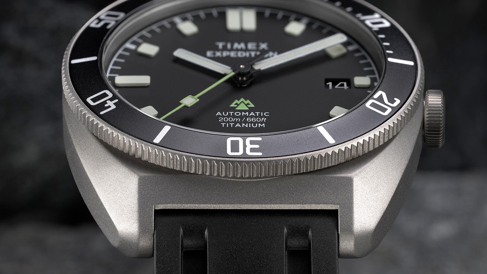 Macro shot of Timex Expedition Pioneer Automatic dial with luminous markers and second hand