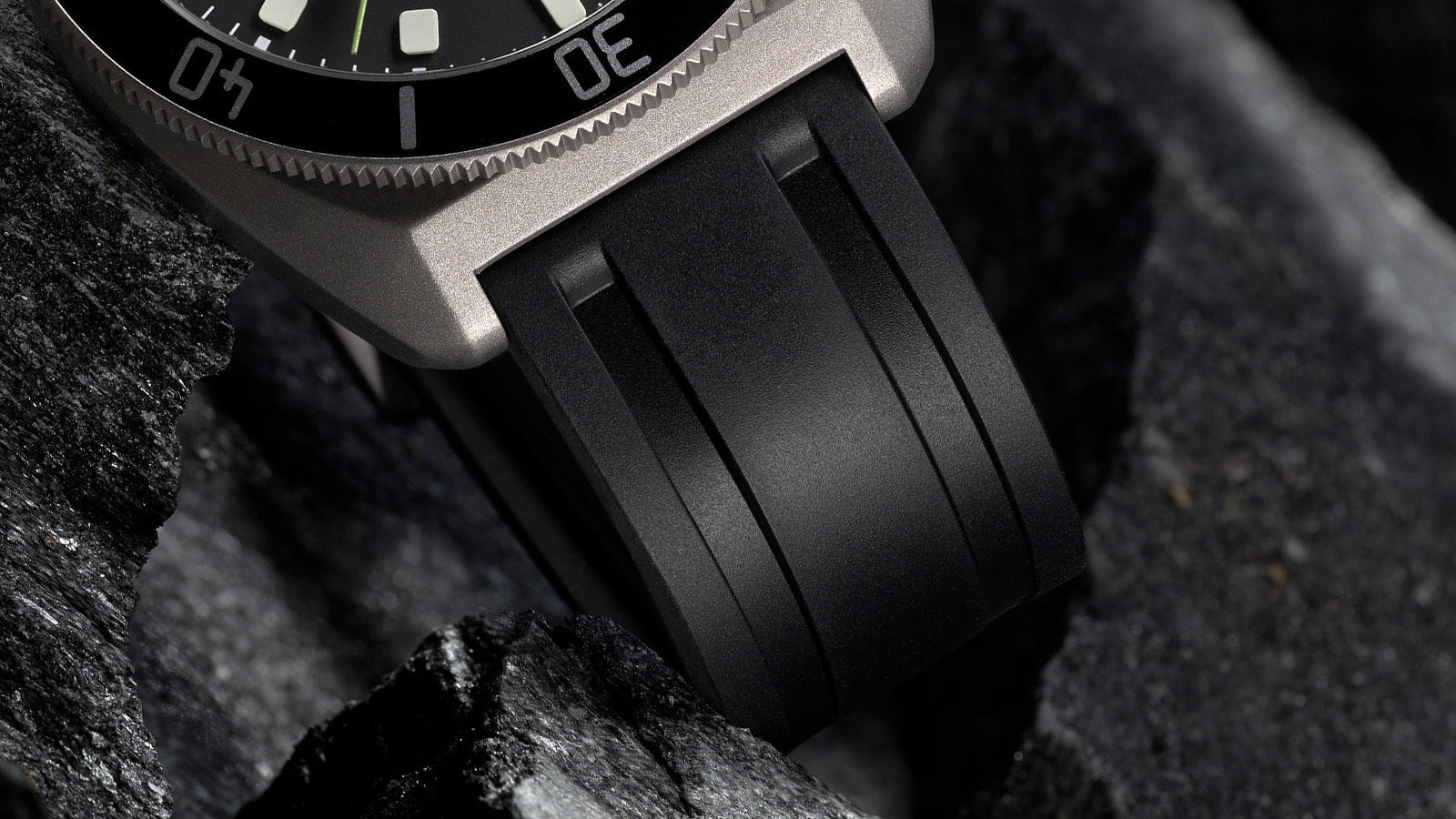 Close-up of black rubber strap on Timex Expedition Pioneer Titanium Automatic watch