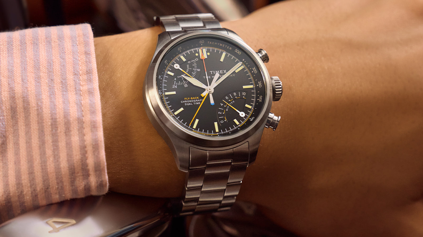 Timex Waterbury Ace Fly-Back Chronograph on wrist highlighting chronograph pushers and dual time subdial
