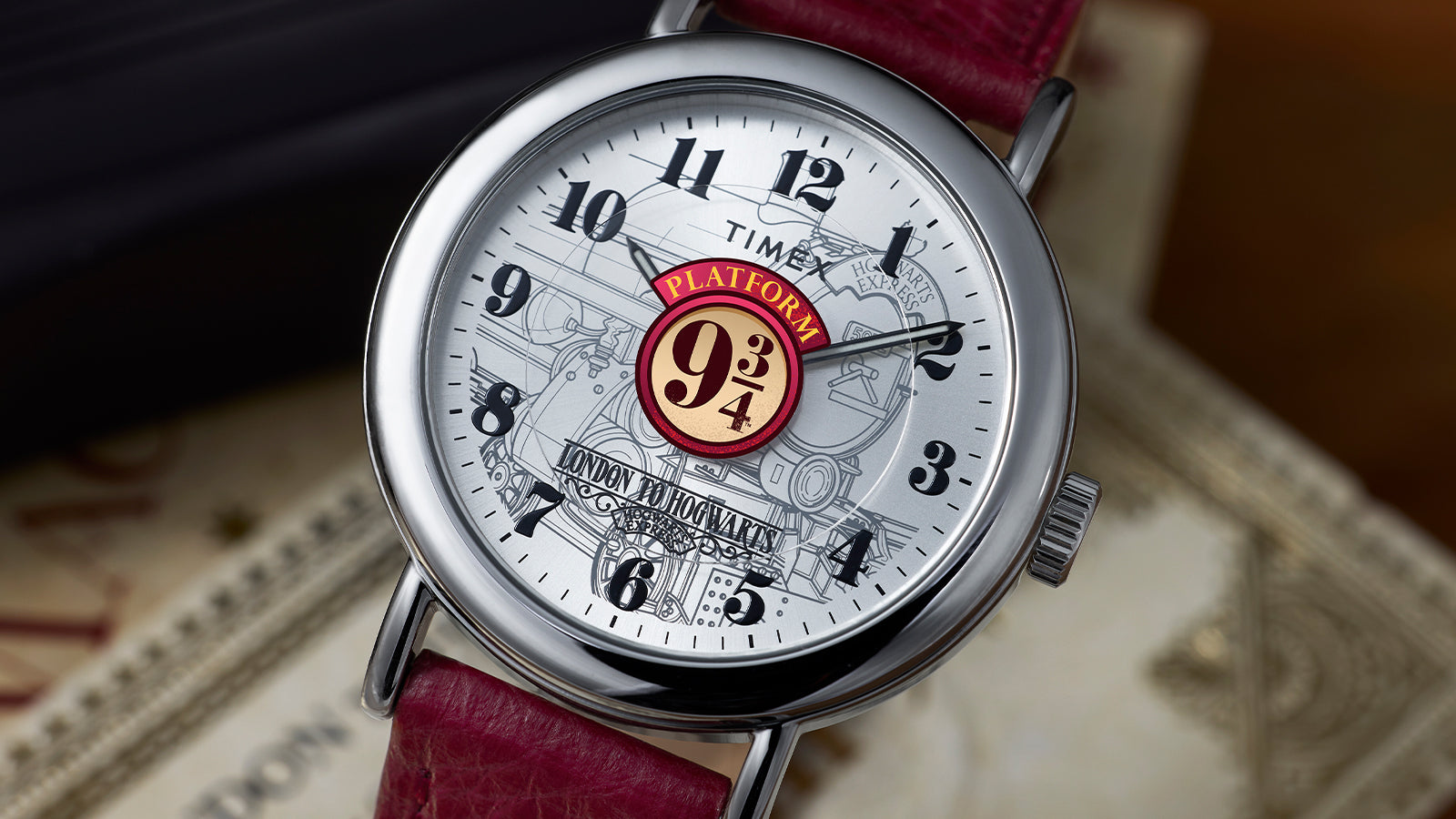 Harry Potter x Timex Weekender Platform 9¾ watch with red leather strap and stainless steel case.