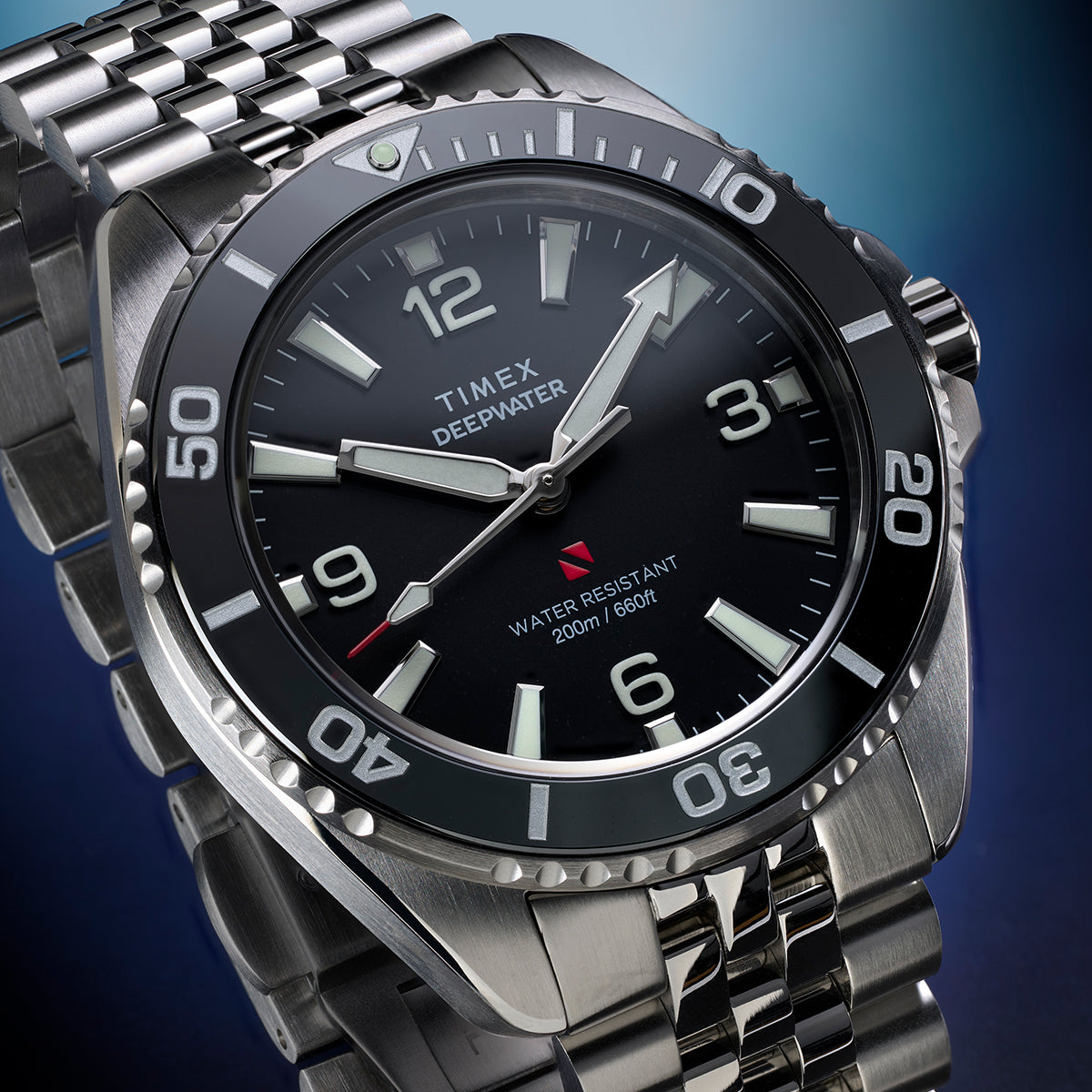 Close-up of Timex Deepwater Arctic watch dial showing luminous indices and 200m water resistance