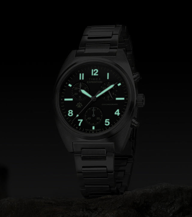 Timex Expedition Capstone Chronograph with glowing lume markers and hands in low light