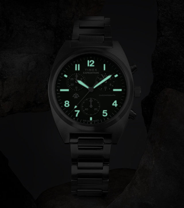 Timex Expedition Capstone Chronograph with glowing lume markers and hands in low light
