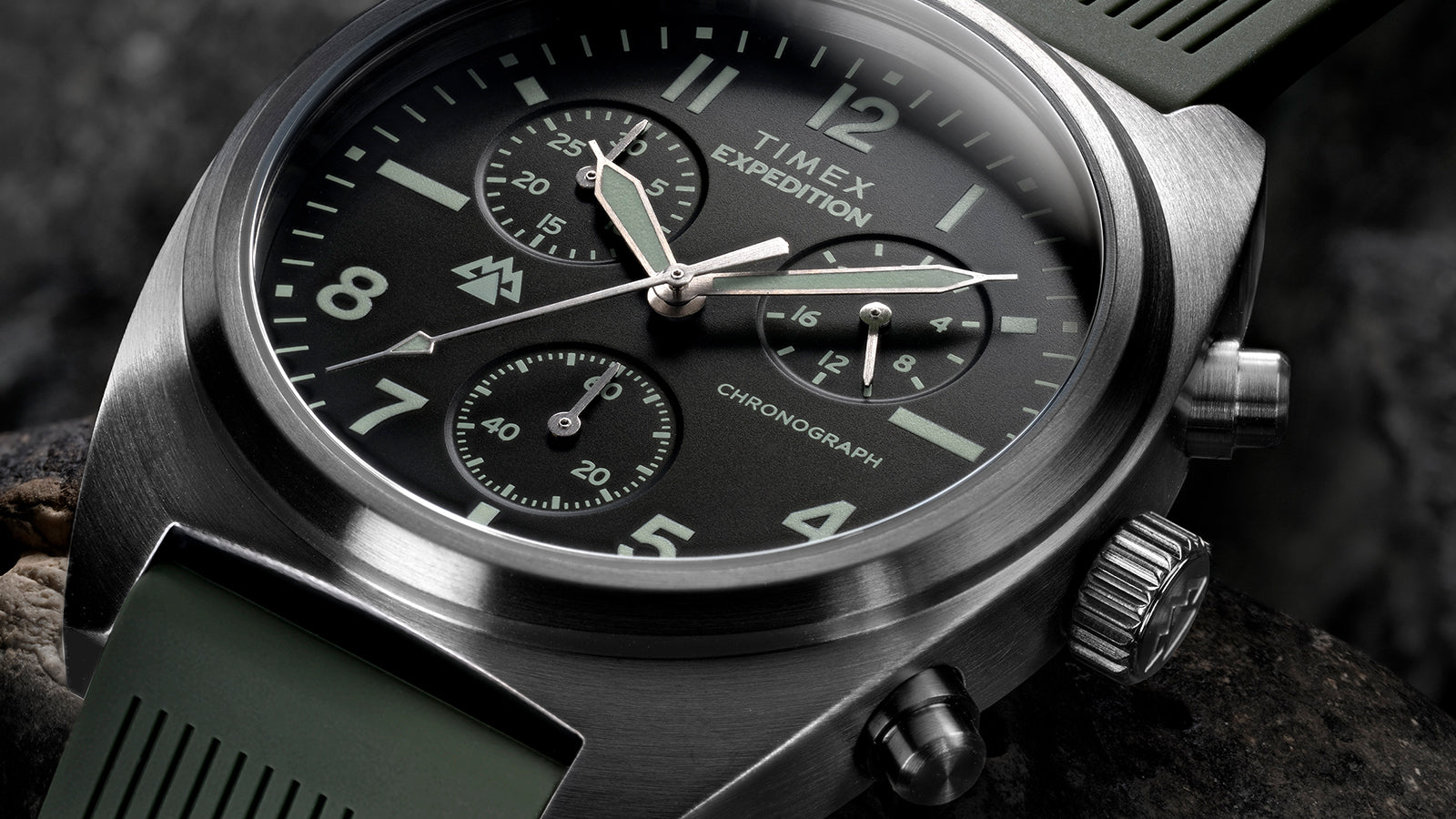 Close-up of Timex Expedition Capstone Chronograph green dial showing subdials and markers