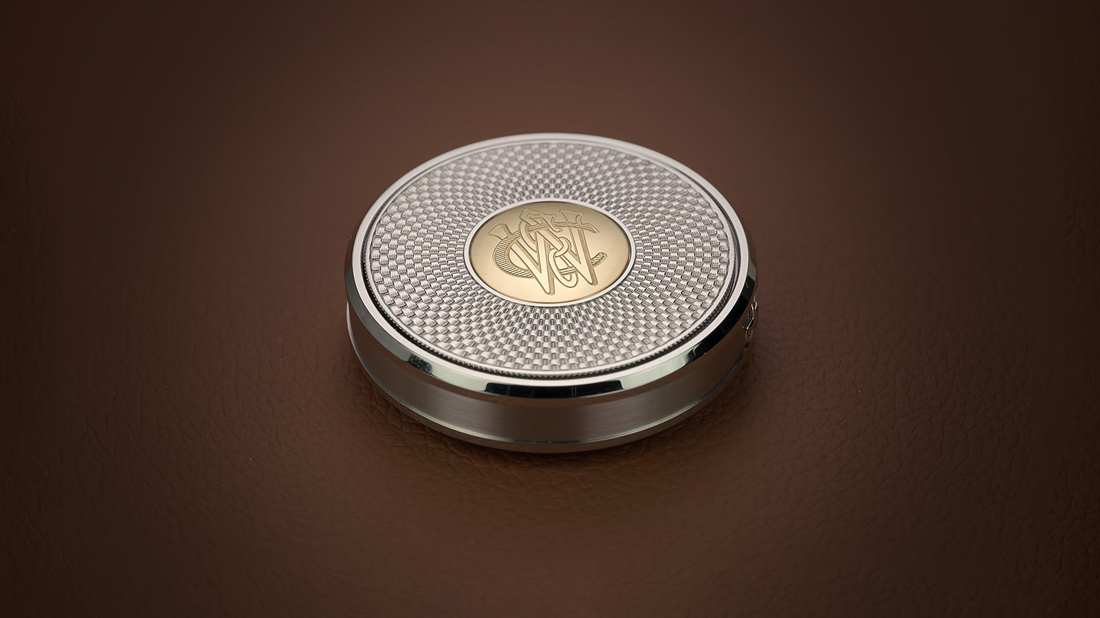 Closed Waterbury America 250 Table Clock showcasing the textured silver-tone cover with an engraved commemorative emblem.