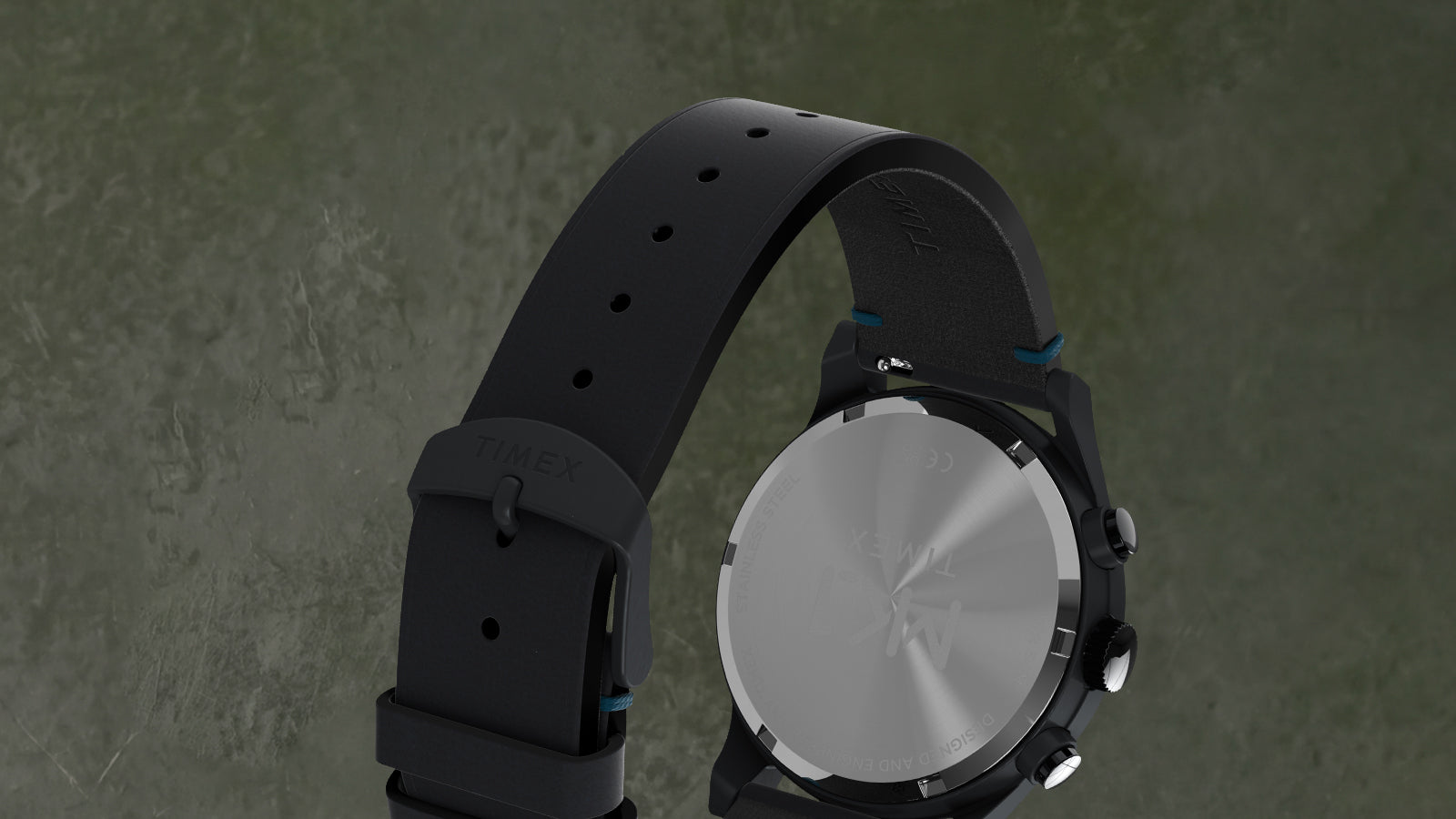 Rear view of the Timex MK1® Chronograph showing the stainless steel caseback, crown, pushers, and black leather strap.