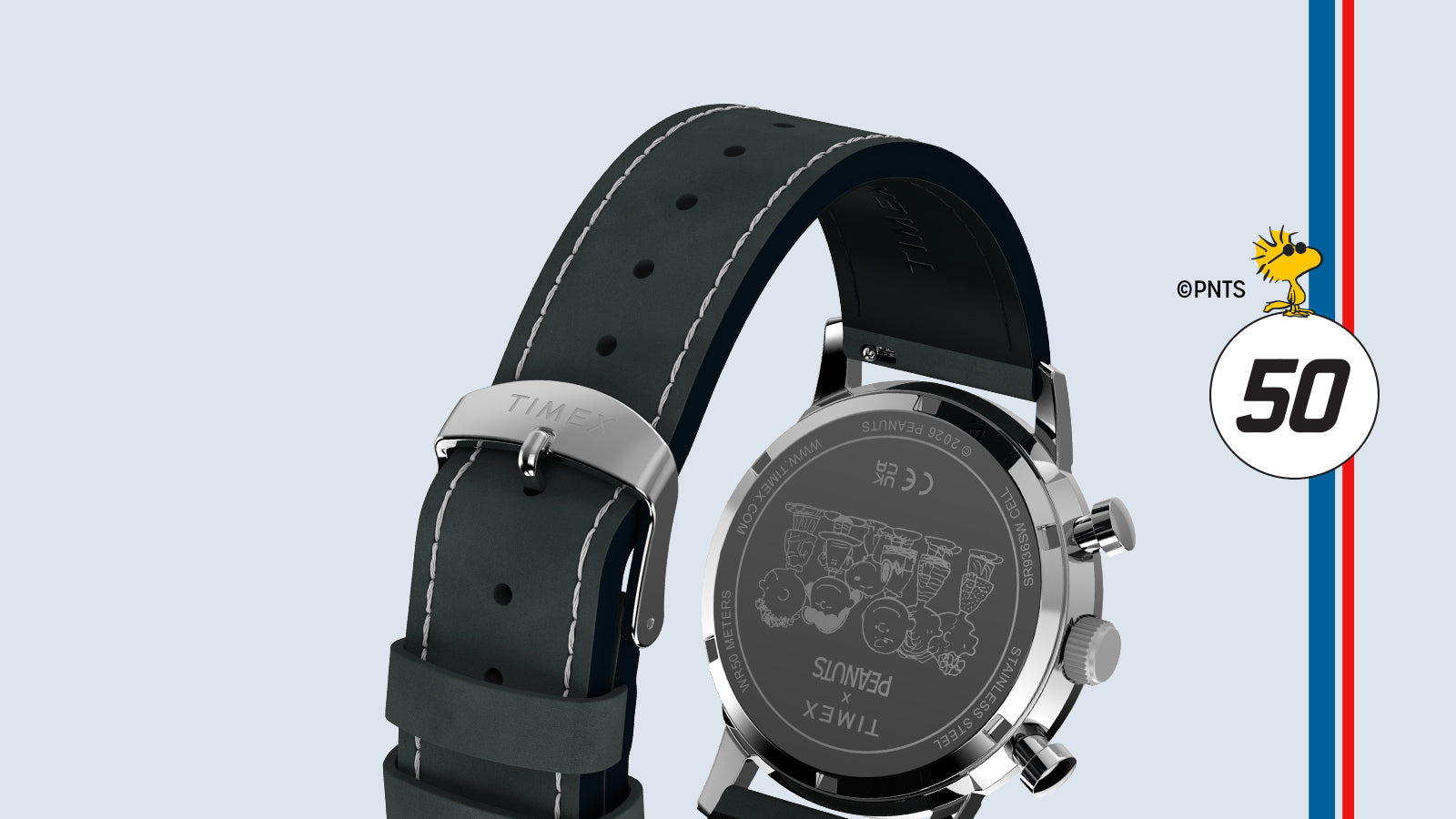 Rear view of the Peanuts® x Timex Marlin® Chronograph showing the engraved Peanuts® caseback and black leather strap with white contrast stitching.