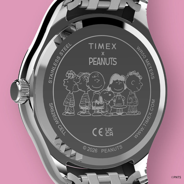 Caseback of the Peanuts® x Timex Legacy Snoopy Umbrella watch featuring an engraved Peanuts group illustration and Timex x Peanuts branding.