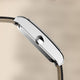 Side profile of the Timex 1976 Lexington Reissue Inspired watch highlighting its slim rectangular stainless steel case and crown.
