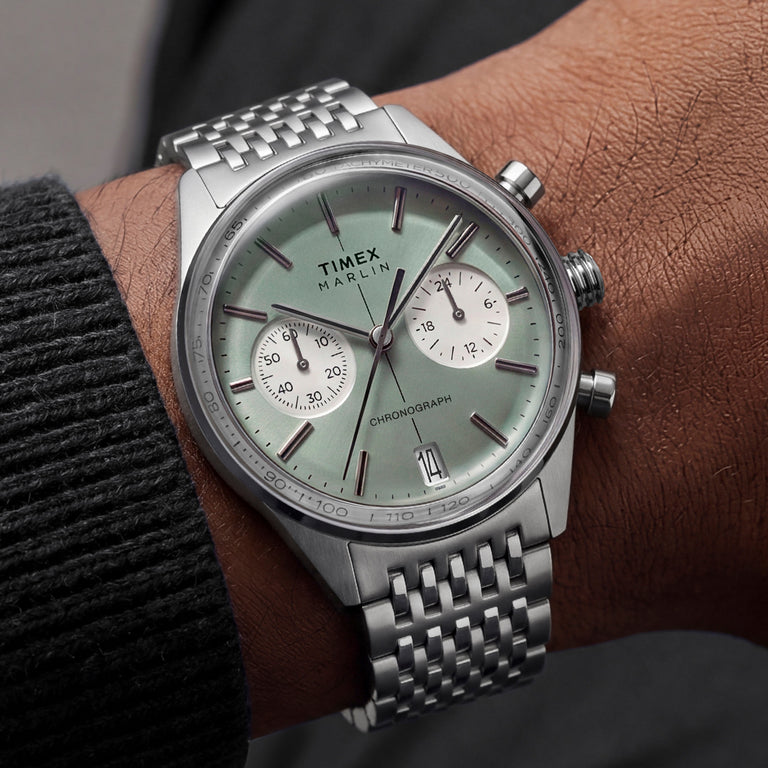 Marlin® Jet Chronograph featuring a light green dial with two white subdials and a stainless-steel bracelet, shown worn on the wrist.