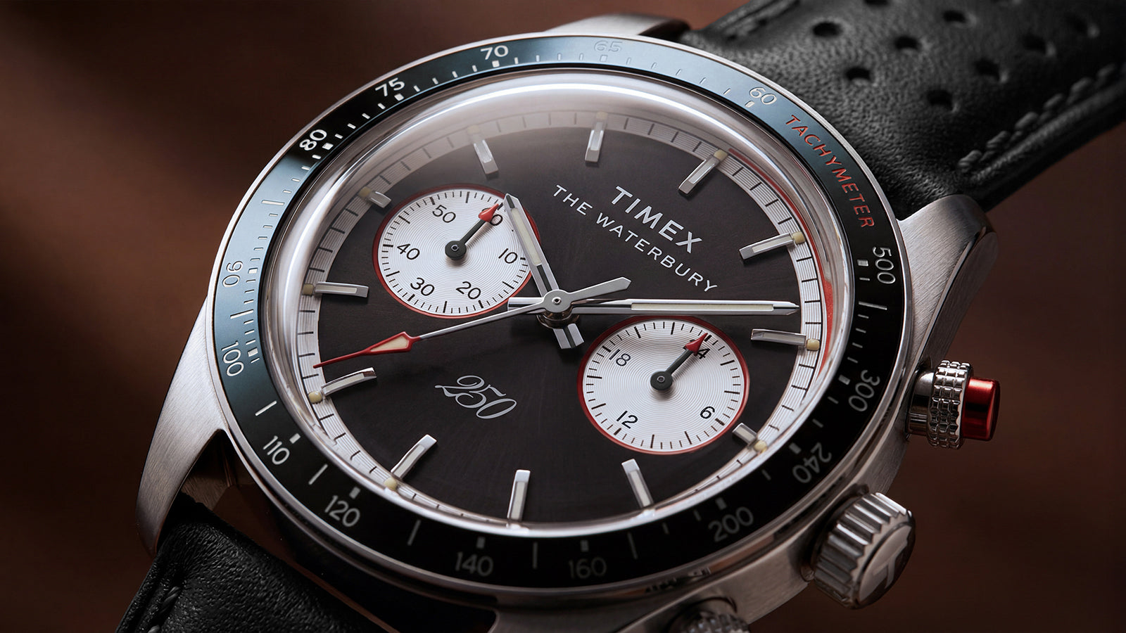 Close-up of the Waterbury Heritage America 250 Chronograph dial highlighting the tachymeter bezel, chronograph subdials, and America 250 commemorative marking.