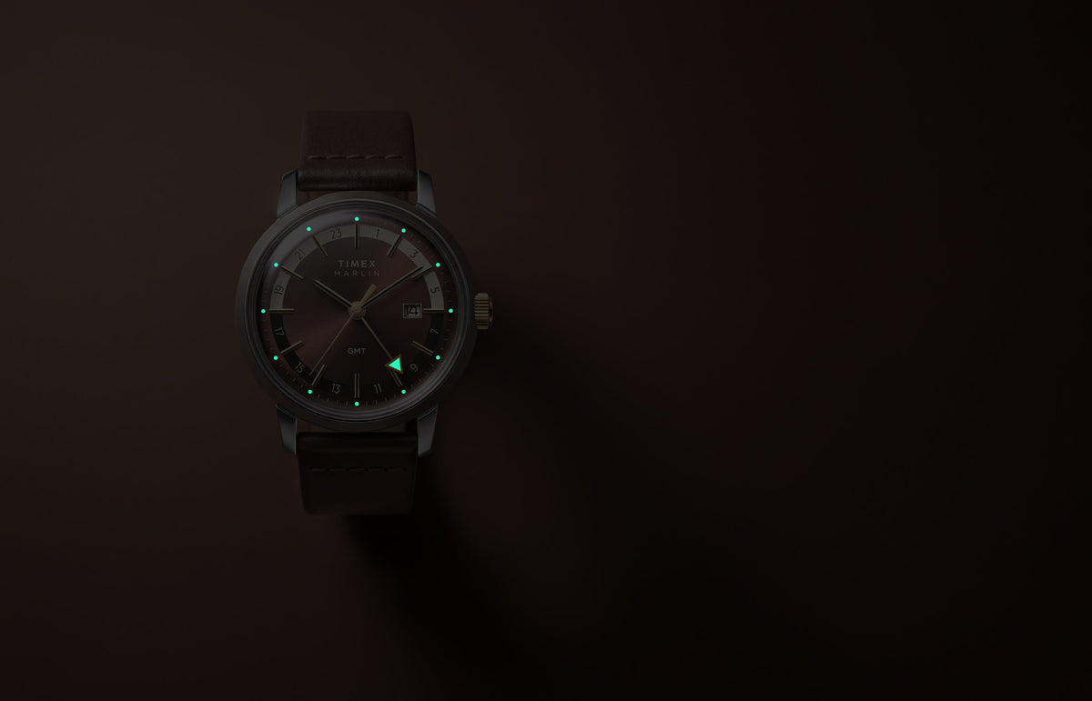 Marlin® Quartz GMT in low light with glowing hour markers and GMT hand.