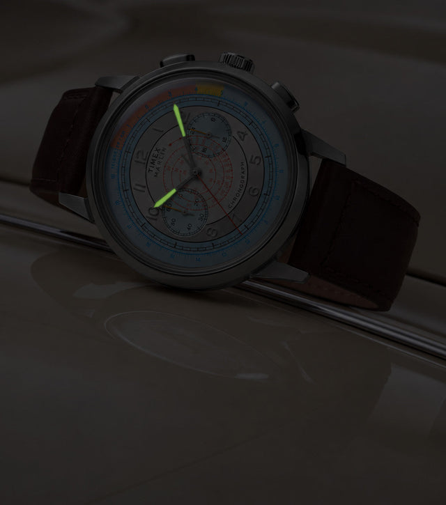 Marlin® Neo Classic Chronograph in low light with green luminous hour and minute hands.