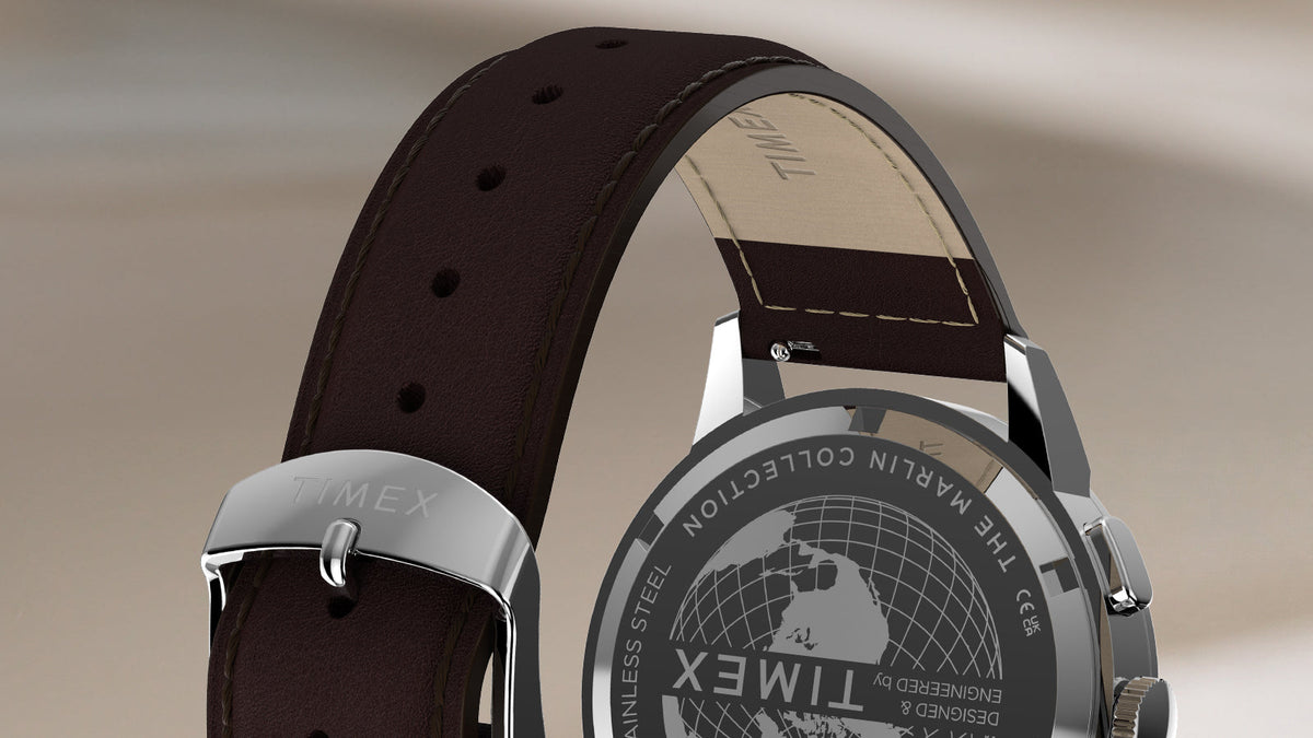 Rear view of the Marlin® Neo Classic Chronograph, highlighting its engraved case back, brown leather strap, and Timex buckle.