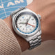 TW2Y94600 Pan Am x Timex Waterbury Automatic GMT watch with a stainless-steel bracelet worn on the wrist.