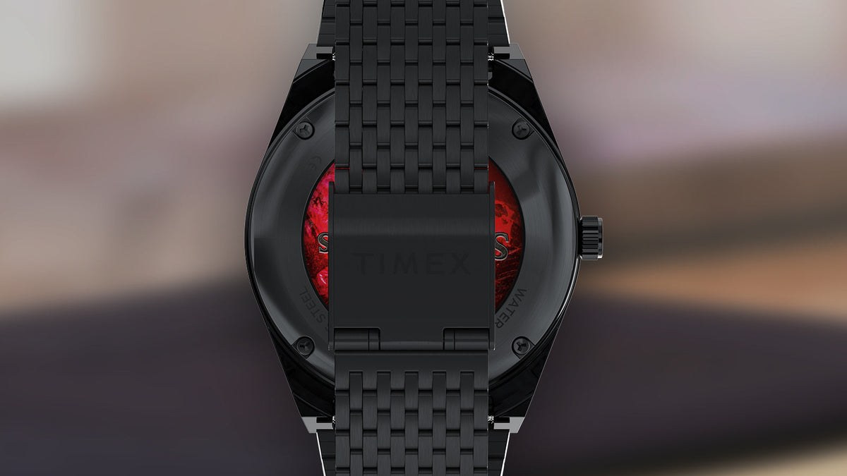 TW2Y99700 Rear view of the Harry Potter x Q Timex watch showing the black bracelet and caseback with a partially visible red Sorcerer’s Stone graphic.