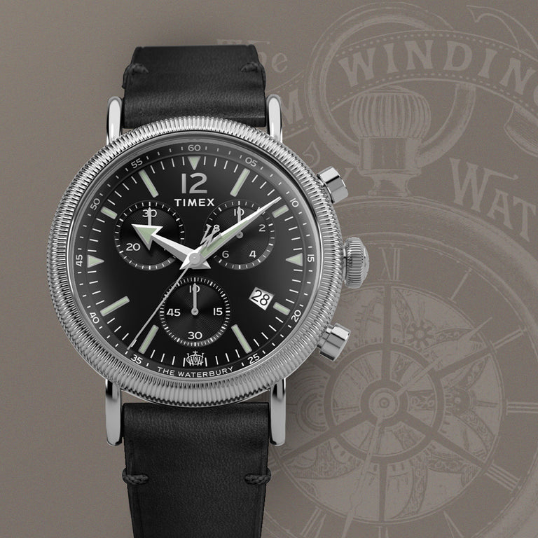 The image shows Waterbury Standard Coin Edge Chronograph with a waterbury dial background.