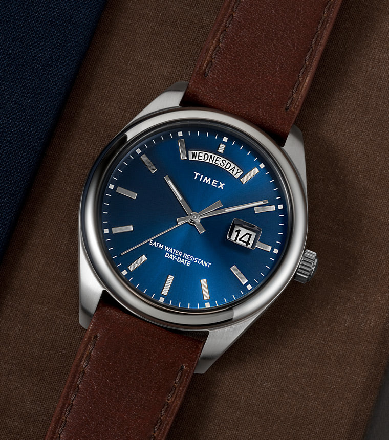 Timex Legacy Leather Strap Watch with blue Dial.