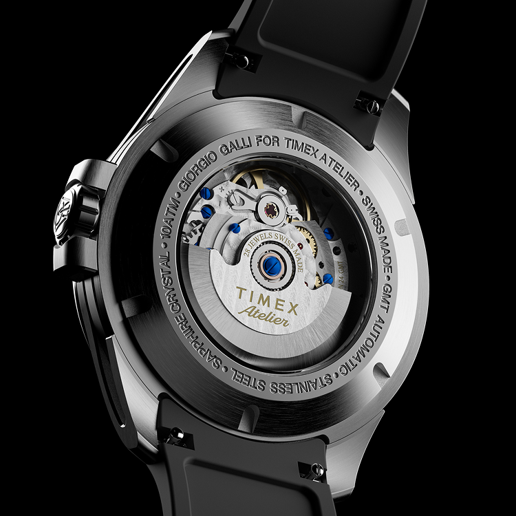 Caseback of the Timex Atelier GMT Automatic showing the Swiss-made movement and engraved rotor.