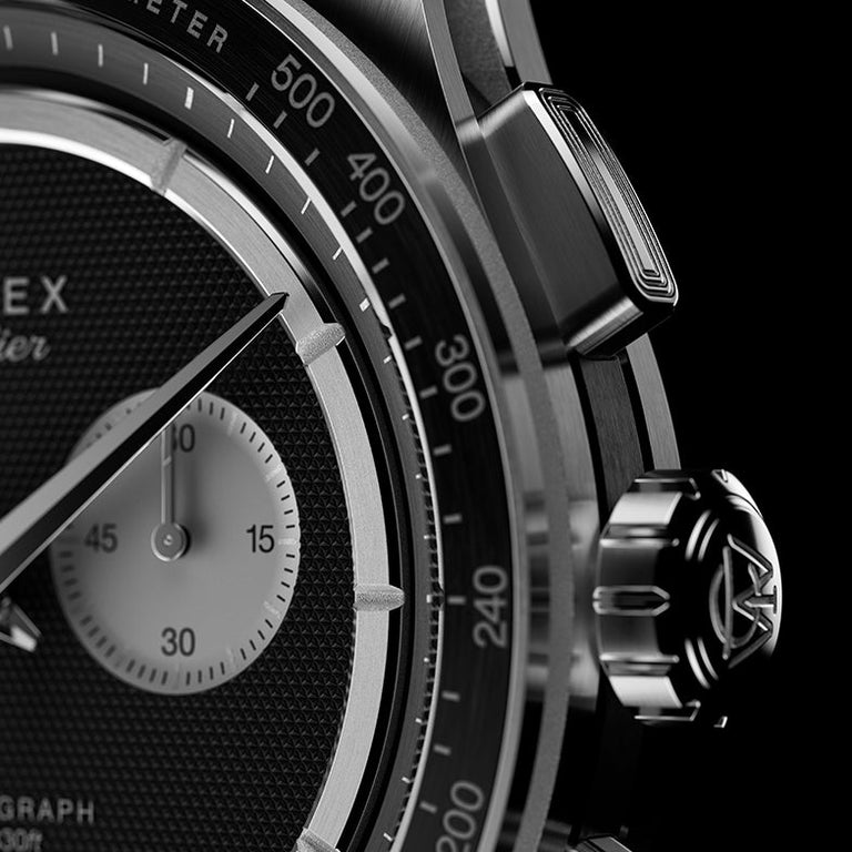 Close-up of Timex Atelier Chronograph Quartz M1a 40mm showing tachymeter bezel, crown with logo, and chronograph pusher