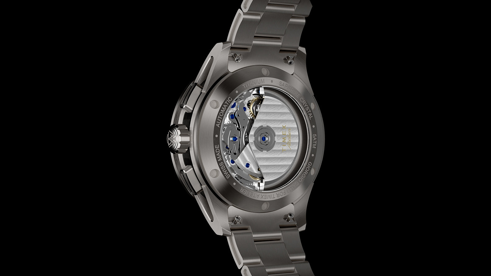 Exhibition caseback of the Timex Atelier Chronograph Automatic M1a Ti revealing the Swiss-made automatic movement through a sapphire crystal display back.