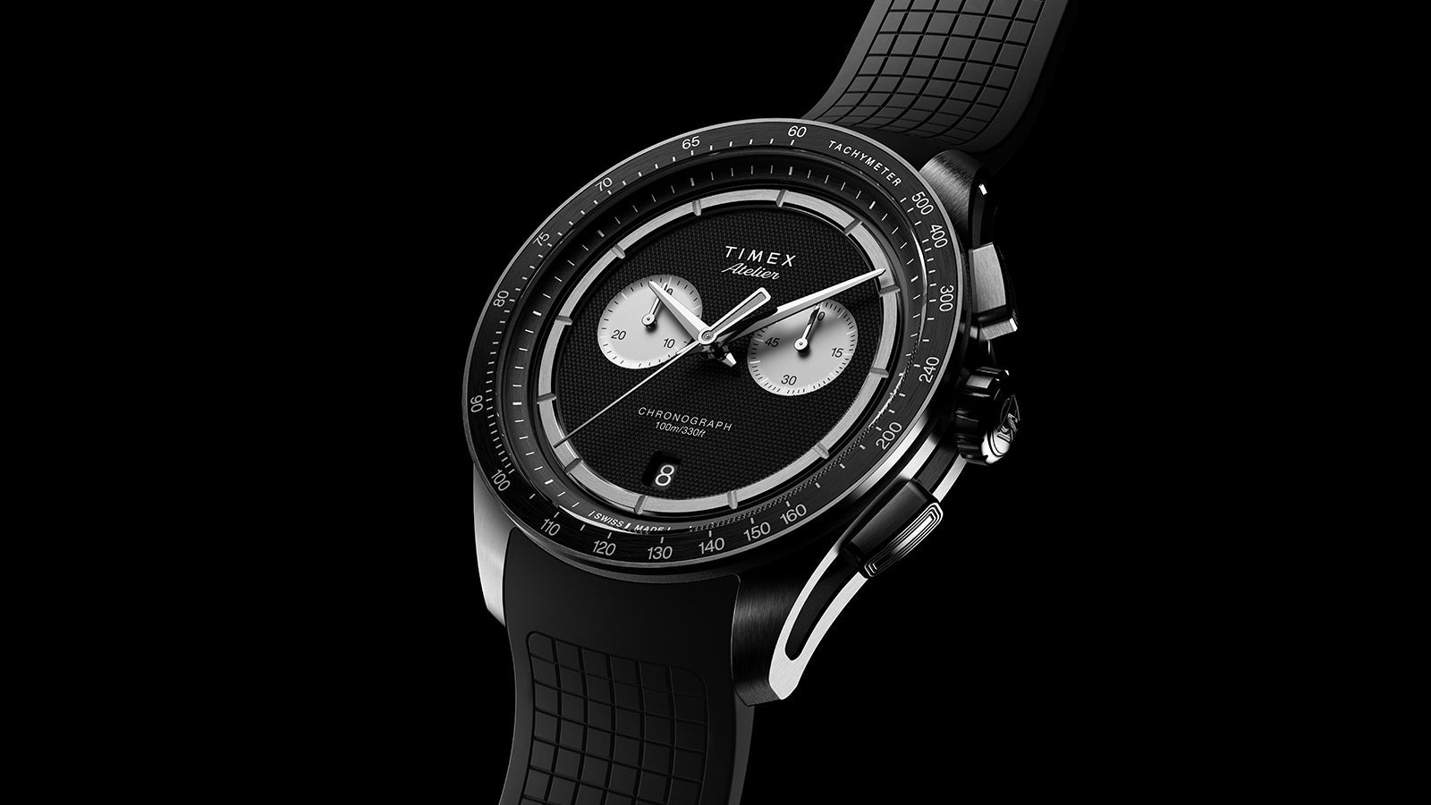 Angled view of Timex Atelier Chronograph Quartz M1a 40mm with black dial and NBR rubber strap