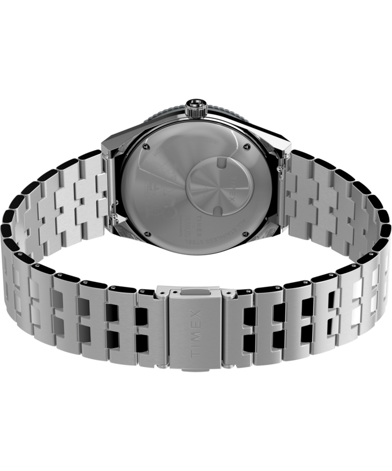 TW2W83300 Peanuts® x Q Timex® GMT 38mm Stainless Steel Bracelet Watch Caseback with Attachment Image