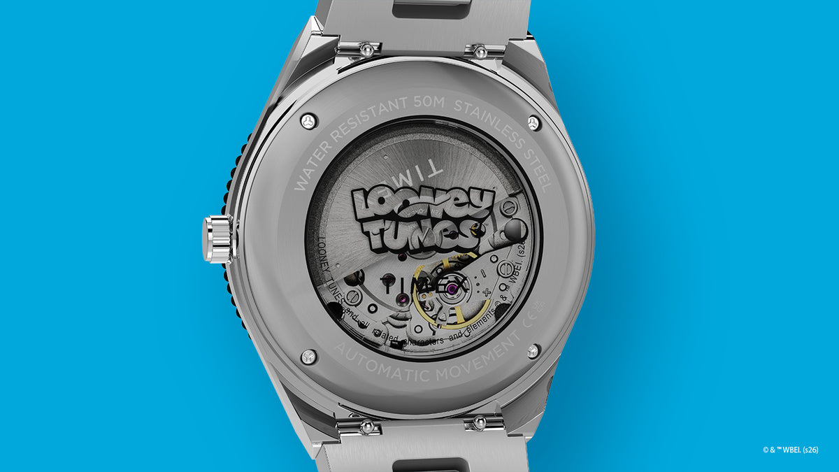 TW2Y99200 Exhibition case back of the Bugs Bunny x Timex M79 Automatic watch showing the movement beneath a Looney Tunes logo.